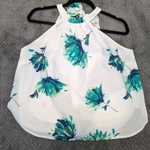 Isani sleeveless blouse. Size medium.